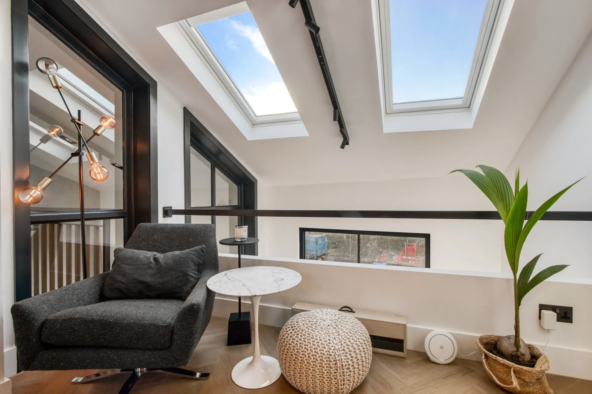 Reading nook beneath skylights in the Kensington home